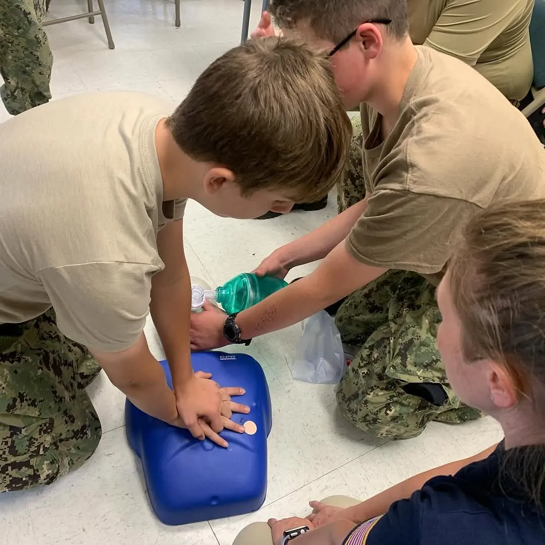 Cadets practicing CPR during medical training